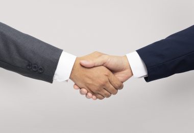 Business agreement handshake